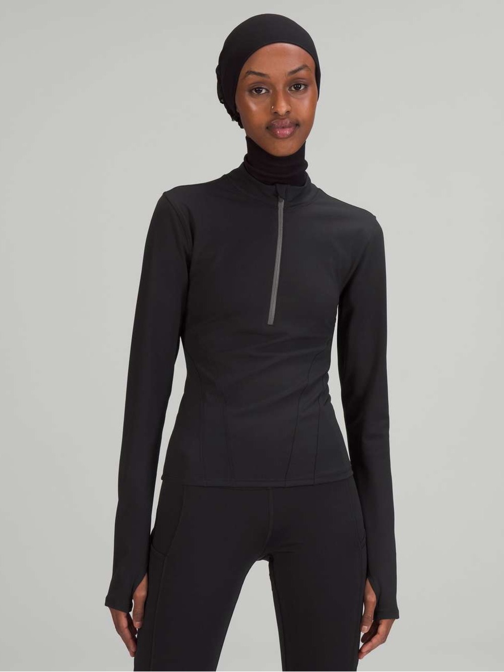 146. Lululemon Luxtreme Running Half-Zip
Black long sleeve reflective size 4